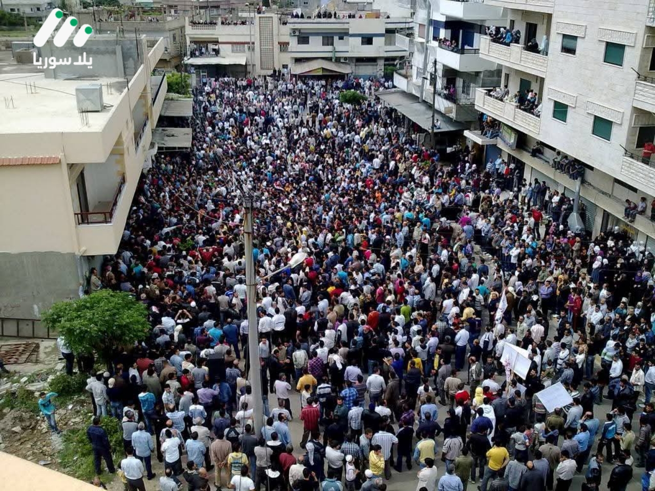 هذه الصورة تخص خبر مجزرة العلبي في اللاذقية 2011.. حين تحوّلت ساحة الحرية إلى ميدان للدم